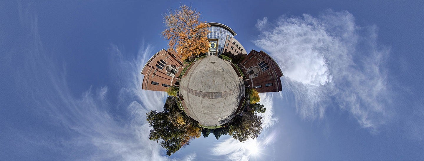 Fish eye lens view of campus near the Lillis Business Complex